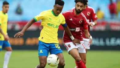 themba zwane of mamelodi sundowns challenged by marwan attia of al ahly during the african football league 2023 match between mamelodi sundowns and al ahly - Egypodcast.